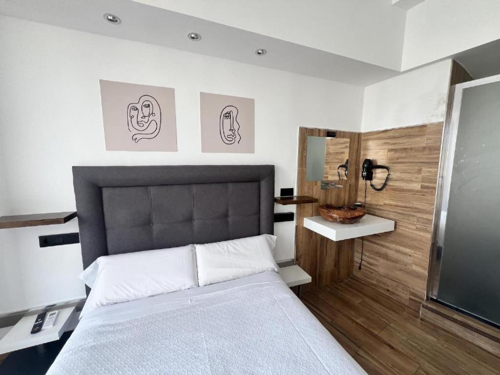 Ilustre Rooms Малага Стая снимка